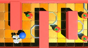 Ein Game, das mit dem Nintendo "Spielestudio" entwickelt wurde: Ein blauer Ball rollt an Äpfeln vorbei durch ein Labyrinth.