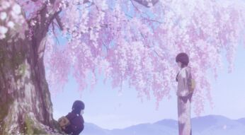 Zwei Personen aus "Meine ganz besondere Hochzeit" unterhalten sich unter einem Baum.